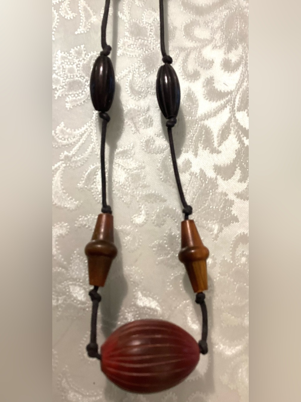 Long necklace with big pendant bead